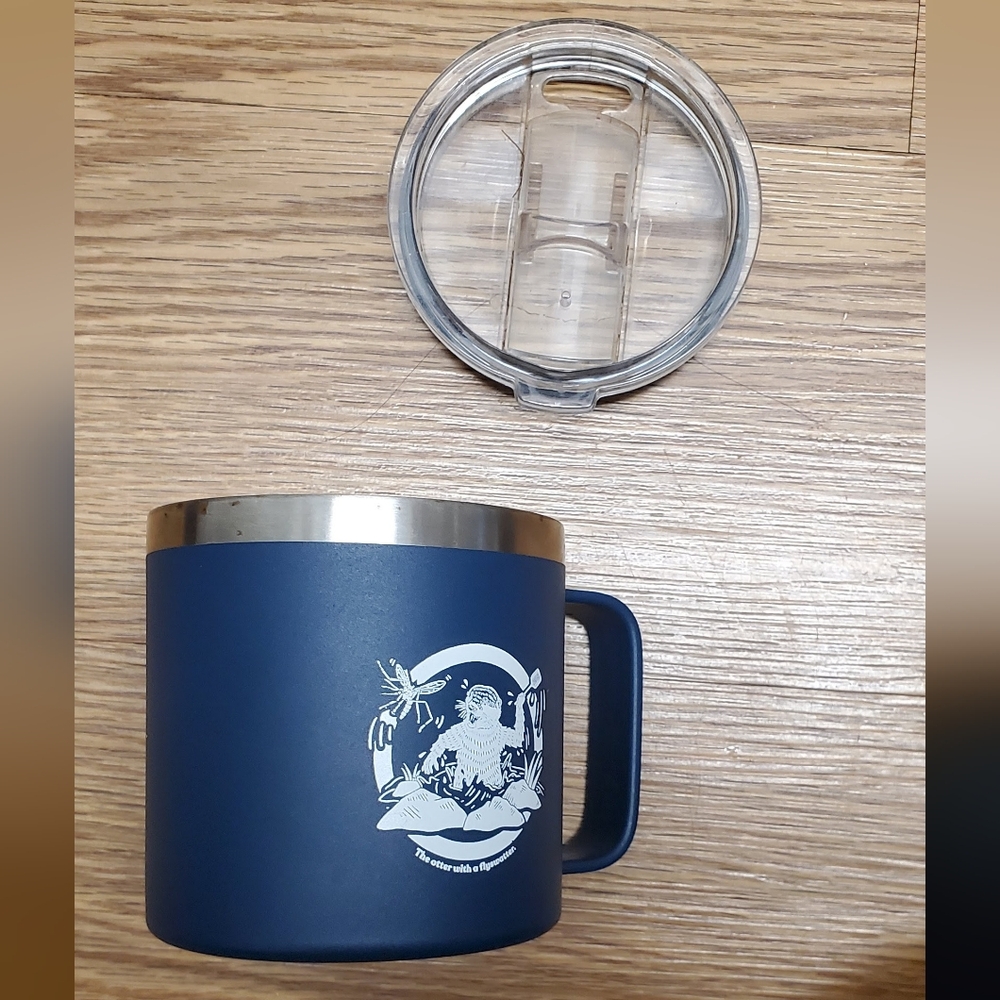 blue 14 oz "otter with a flyswatter rambler yeti travel mug with handle